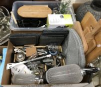 Two boxes of assorted kitchenalia to include an Alessi mug, various slate table mats,