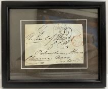 A framed and glazed historical postmark with address 