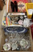 Two boxes of assorted sundry items to include various drinking glasses, a pair of riding boots,