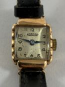 An 18-carat gold cased Roamer ladies wristwatch with silvered dial and Arabic numerals