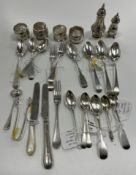 A collection of silverwares to include various teaspoons, dessert spoons, mustard spoon, fork,