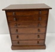 An early 20th Century stained pine specimen chest/apprentice chest,