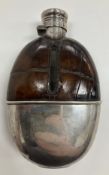 A Victorian silver and leather mounted hip flask (by Sampson Mordan & Co, London 1883),