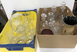 A pair of mallet-shaped cut glass decanters and stoppers, three others various,