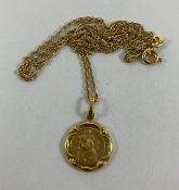 A 10-carat gold chain link necklace set with gold St. Christopher, 3.