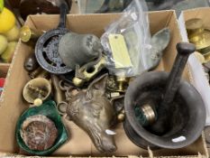 A 19th Century cast iron pestle and mortar, a verdigris patinated bronze pestle and mortar,