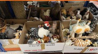 Fives boxes of assorted ornamental animal figures to include a large selection of cats and chickens