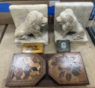 WITHDRAWN A pair of carved alabaster seated lion bookends, 15.4 cm wide x 10 cm deep x 15.