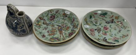 A collection of four Chinese celadon glazed plates with polychrome enamel decoration of butterflies