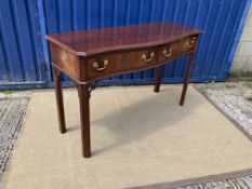 A George III style mahogany serpentine fronted side table,