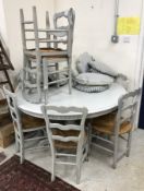 A painted wooden breakfast table of circular form raised on pedestal base 140 cm diameter x 78.