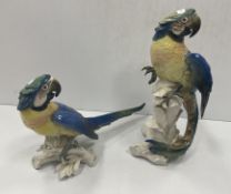 Two Karl Ens polychrome decorated porcelain figures of parrots,