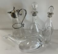 A modern mallet-shaped clear glass decanter with silver rim (by JA Campbell, London 2003),