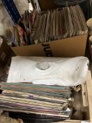 Two boxes of assorted vintage records/LPs together with a Victorian coal box/piano stool containing