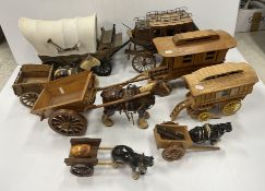 A collection of various wooden scratch-built models of carriages including US Mail Deadwood Stage