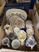 A box containing assorted decorative china to include Mason's & Poole jugs,