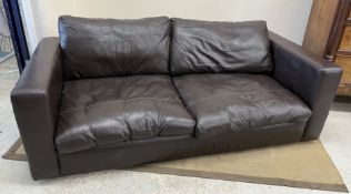 A modern brown leather upholstered two seat sofa retailed by Sofa Workshop 201 cm wide x 100 cm