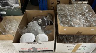 Three boxes of assorted glassware together with a box containing a glass cake stand and cover etc