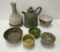 A collection of various studio pottery including a Daniel Boyle glazed pottery teapot bearing