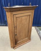 A 19th Century pine hanging corner cupbo