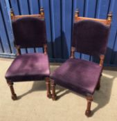 A pair of late Victorian carved walnut f