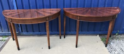 A pair of modern mahogany side tables of