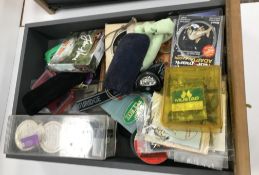 A collection of various fishing tackle to include a collection of various Toby and other spinners