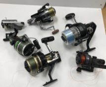 A collection of various fishing tackle including six various reels including Ryobi Southern Cross