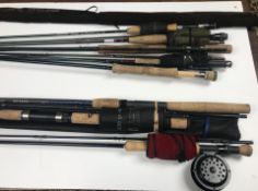 A collection of nine various rods to include a Redington Red Fly 9' 6