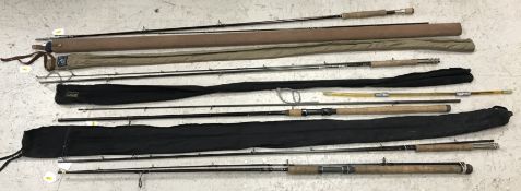 A Diawa Alltmor Orator two piece rod with silk lined canvas bag and suede effect covered hard case,