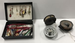 A collection of various fishing equipment including a brown painted metal wading staff landing net