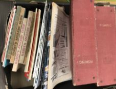 A box of various fishing pamphlets,