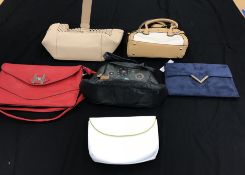 A box containing six handbags to include a Radley black leather, Jasper Conran cream and tan,