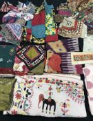 Box containing remnants of antique textiles mainly of Eastern origin to include Icat, Gujarati,