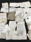 A box containing a hand crocheted table runner approx.