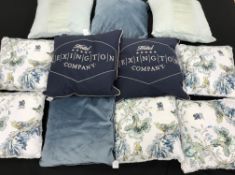 Eleven cushions in cream and blue colourways to include five by English Heritage,