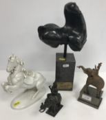 A patinated bronze study of a horse tors