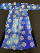 A mid 20th Century blue and gold damask