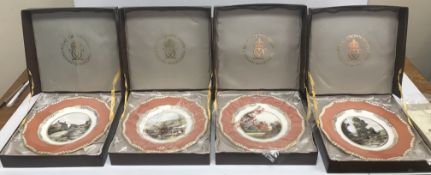 A set of twelve Royal Crown Derby plates
