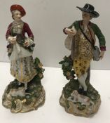 A pair of 19th Century Derby figurines a