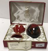 A Royal Doulton flambé egg and egg cup,