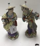 A pair of Dresden porcelain figures of M