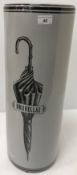 A china umbrella stand in the manner of Fornasetti,