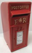 A reproduction Elizabeth II red painted metal post box,