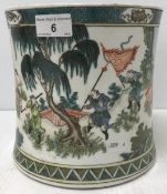 A Chinese famille verte brush pot of waisted form, depicting hunters in a landscape,