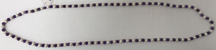 An amethyst and pearl beaded necklace,