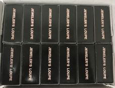 A box containing six jeweller's loops,