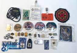 A collection of assorted athletics, track and field and other sporting badges, patches,