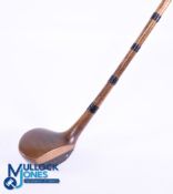 Spalding Patent dark stained persimmon brassie showing the Isaac Mackie Patent construction