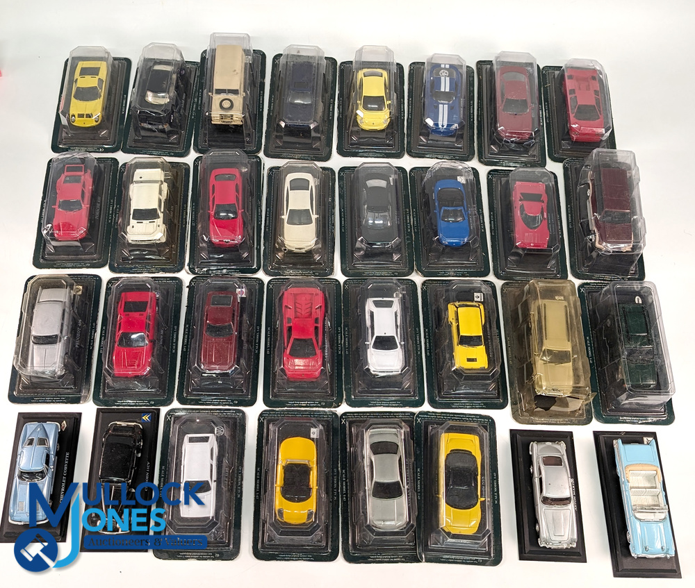 The Ultimate Car Collection By Del Prado: a collection of boxed and unboxed 1:43 scale cars and